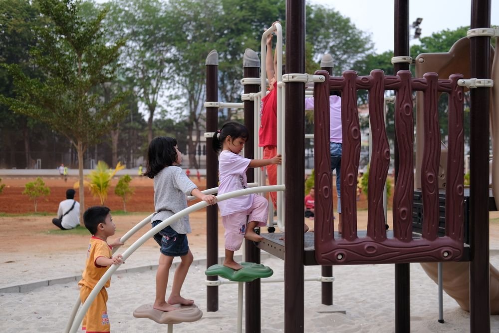 Children playing together in the outdoor play yard